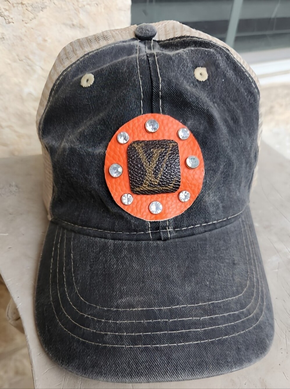 Black Distressed Baseball Cap with Orange Stud Accent